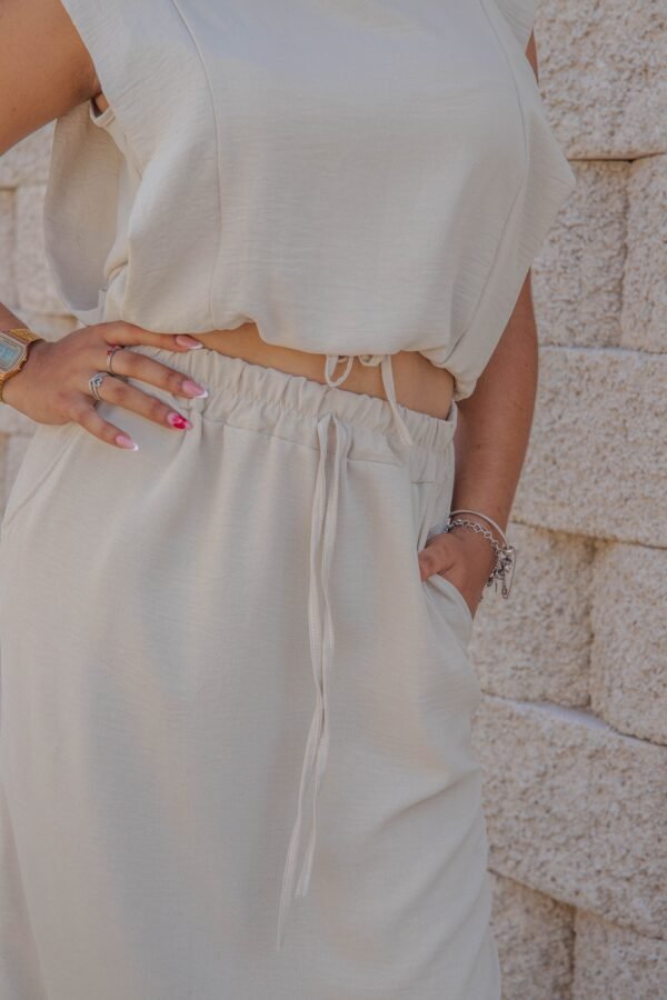 Conjunto dos blusa y piezas falda pareo beige