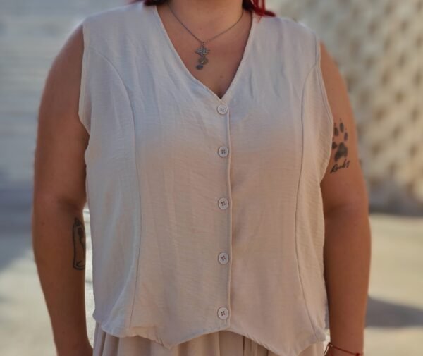 Conjunto dos piezas pantalón y chaleco color beige