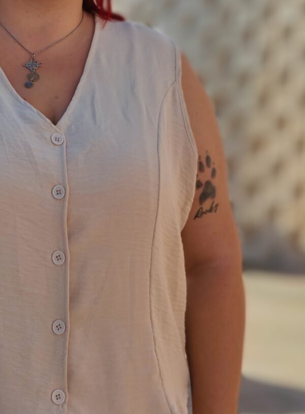 Conjunto dos piezas pantalón y chaleco color beige